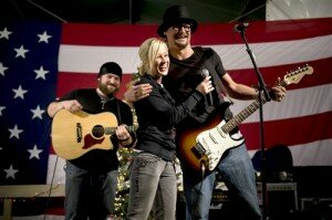 Grammy award-winning musician Kid Rock, American Idol contestant and country musician Kellie Pickler, and musician Zack Brown entertain troops stationed at Kandahar, Afghanistan, Dec. 17, during the 2008 USO Holiday Tour. DoD photo by U.S. Navy Petty Officer 1st Class Chad J. McNeeley
