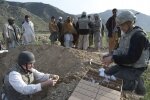 U.S. Department of Agriculture and Konar Provincial Reconstruction Team members conduct bulk density soil samples in Marawara District, Afghanistan. Photo By: U.S. Navy Lt. j.g. James Dietle